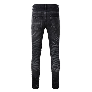 Men's slim fit distressed denim jeans in charcoal grey with back tiger-wash fading