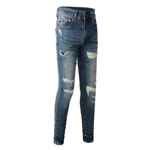 Men's slim fit distressed blue denim jeans with stylish ripped patchwork and washed finish
