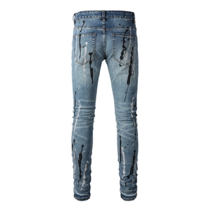 Jeans da uomo slim fit lavaggio azzurro con design di schizzi di vernice bianco e nero