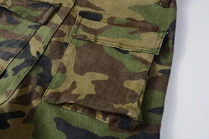 Macro detail of military camouflage cargo pocket with durable cotton twill stitching