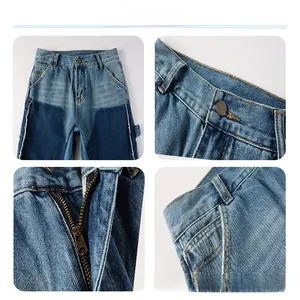 Close-up of contrast denim stitching, metal zipper fly and raw edge detail on jeans