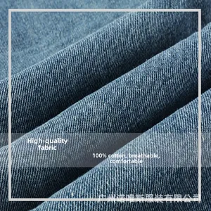 Macro shot of 100% cotton breathable blue denim fabric with twill texture detail