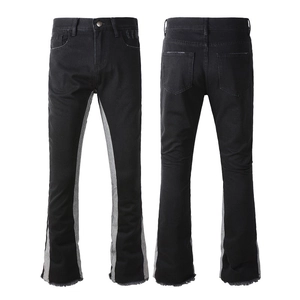 Front and back view of black flared jeans with grey contrast panels and raw hems