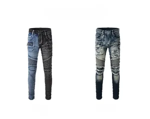 Detail view of slim fit biker jeans with distressed knee pleats and zip accents