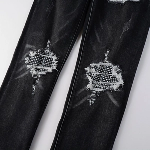 Men's American high street black distressed jeans with rhinestones and slim fit design