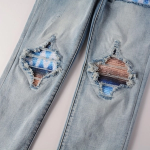 Men's American retro distressed light blue jeans with striped patches and diamond rips