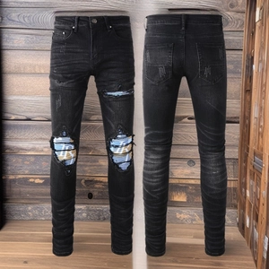 Men's slim fit black distressed jeans with striped knee patches and washed charcoal finish