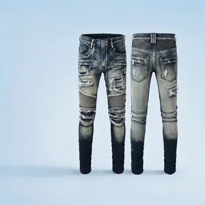 Slim fit biker jeans for men with vintage wash, pleated knees and moto style details
