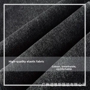 Detailed macro view of black twill denim fabric texture with high elasticity and cotton