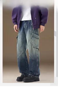 Detail of blue wash cargo jeans showing multi-pocket structure and flap side pockets