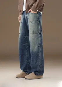 Side view of men's vintage blue utility jeans featuring large cargo pockets and wash details