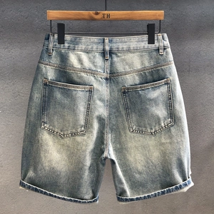 Men's retro light blue washed denim shorts in a high-waisted straight fit with back pockets