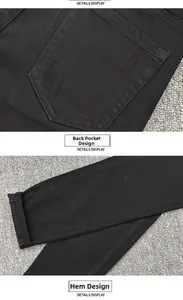 Detail view of back pocket and hem design on slim fit black distressed denim jeans