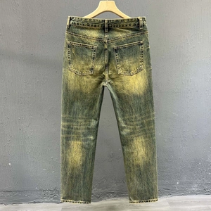 Men's retro slim fit distressed denim jeans in light yellow-green acid wash finish