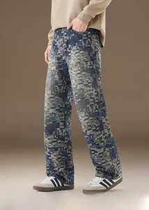 Detail view of men's slim fit jeans with unique brick-patterned texture and vintage wash