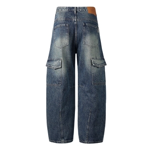Relaxed fit dark blue cargo jeans with vintage wash and functional side flap pockets