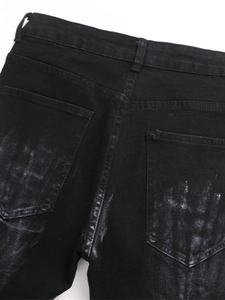 Herren Baggy Jeans in Schwarz mit Sternenprint und Graffiti-Details an den Gesäßtaschen