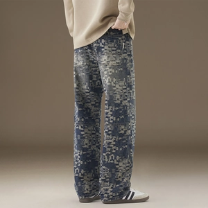Slim fit light wash distressed denim jeans for men with vintage pixelated aesthetic effect