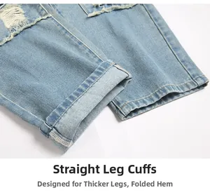 Detail view of light blue straight leg jeans hem with distressed edges and denim texture