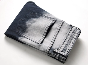 Jeans da uomo elasticizzati strappati in blu scuro con dettagli candeggiati fashion