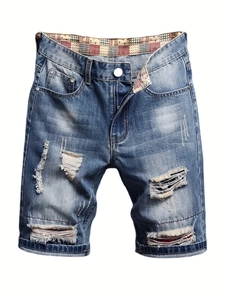 Mens distressed denim shorts with rip detail and classic blue wash in loose fit