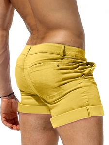 Bright yellow men's casual cotton twill shorts with rolled hem and back pocket detail