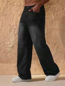 Men's retro washed black loose fit paneled jeans with a wide leg and straight cut