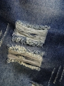 Men's retro street style denim shorts in dark blue with distressed ripped details