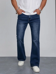 Jean bootcut slim pour homme en bleu foncé avec délavage moustaches et style tendance