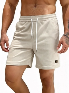 Men's summer corduroy shorts in beige with elastic drawstring waist and vertical texture