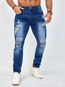 Slim fit men's distressed denim jeans with vintage wash and ripped knee details in dark blue