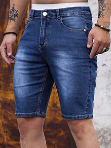 Men's slim fit distressed blue denim shorts with vintage wash and button fly detail