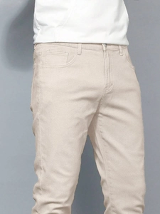 Pantalon homme coupe ajustée en coton beige extensible pour le bureau chic