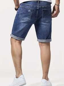 Men's slim fit distressed denim shorts with cuffed hem and washed blue finish