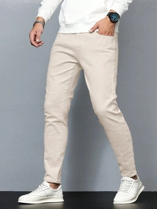 Pantalon chino stretch beige clair pour homme avec coupe ajustée et cinq poches