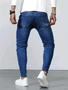 Herren Skinny Jeans in Dunkelblau mit Waschung-Effekt und symmetrischen Gesäßtaschen