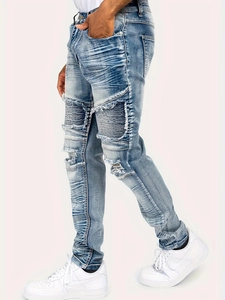 Men's light blue slim fit distressed biker jeans with pleated patches and ripped details
