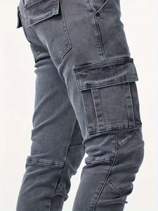 Men's dark grey stretch cargo jeans with side flap pockets and ergonomic stitching details