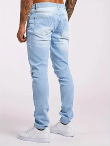 Slim fit light blue wash denim jeans for men with five-pocket styling and back view
