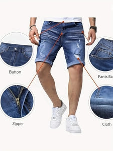Slim fit distressed blue denim shorts for men with ripped details and rolled cuffs