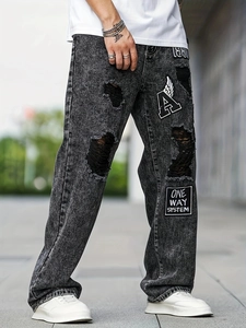 Men's baggy ripped jeans in washed grey with 1991 embroidery and urban streetwear style