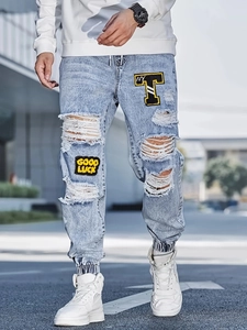 Men's blue slim ripped jeans with embroidery patches and elastic cuffs for casual streetwear