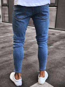 Men's slim fit light blue cropped jeans with ripped knees and yellow stitching