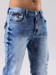 Men's slim-fit blue heavy washed denim jeans with bold white contrast stitching details