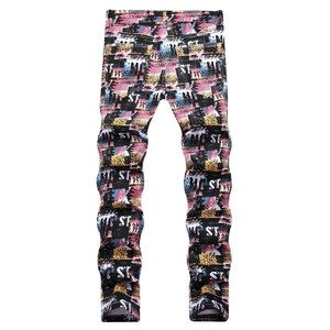 Men's slim fit jeans featuring bold street style graffiti print and ST graphic patterns