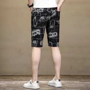 Rear view of slim fit black cotton blend shorts with LSKB letter print and back pockets