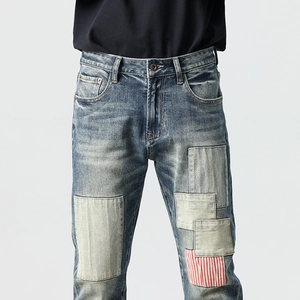 Men's retro slim straight patchwork jeans with stylish multi-color denim patches