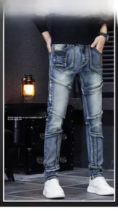 Détail du jean slim pour homme avec poches en patchwork et coutures apparentes