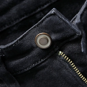 Slim fit black distressed jeans for men with antique bronze button and gold zipper detail