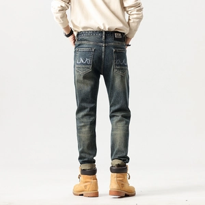 Classic slim straight leg men's jeans with vintage blue-green wash and back pocket embroidery